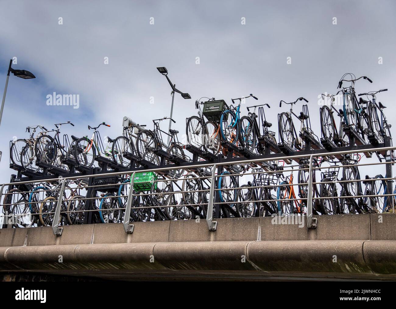 Bicycles on a rack in Amsterdam Stock Photo