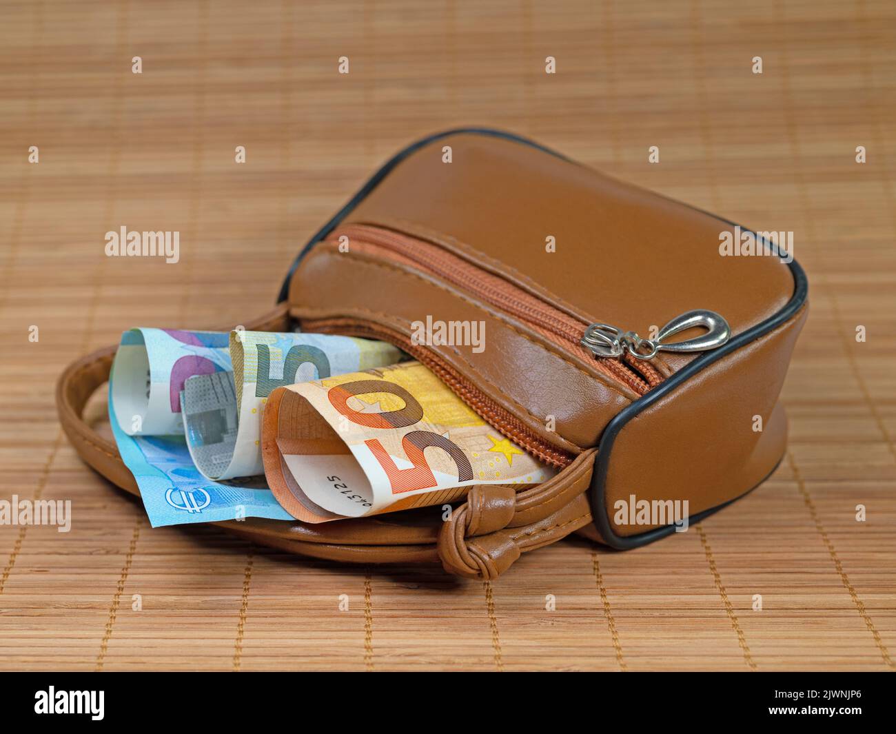 Small bag with euro banknotes Stock Photo