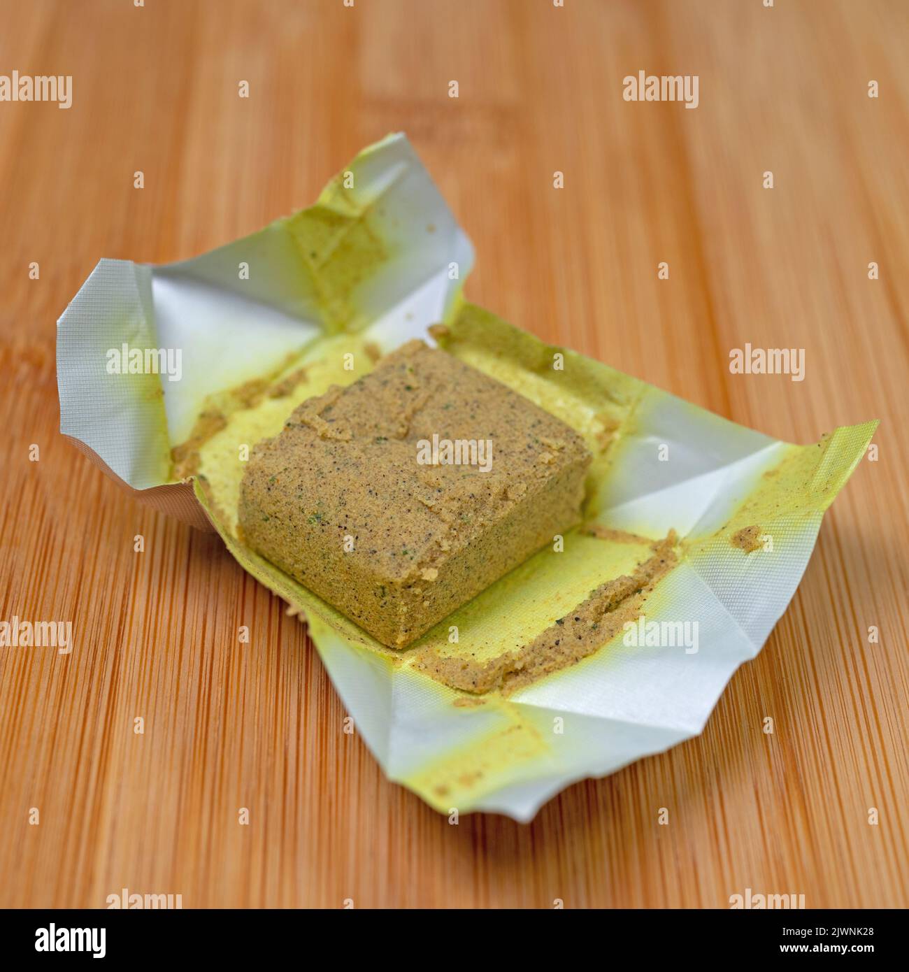 Vegetable bouillon, bouillon cubes in a closeup Stock Photo
