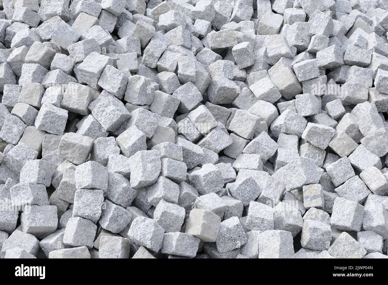 Granite paving stones in typical cube shape Stock Photo