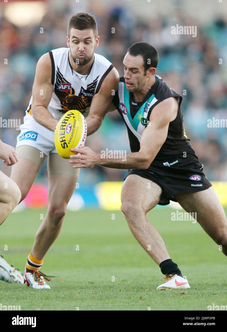 Matthew Broadbent of Port Adelaide contests for loose ball with Matt  Suckling of Hawthorn during round eleven of the AFL, Port Adelaide vs  Hawthorn, AAMI Stadium, Adelaide, Sunday, June 10, 2012. (AAP