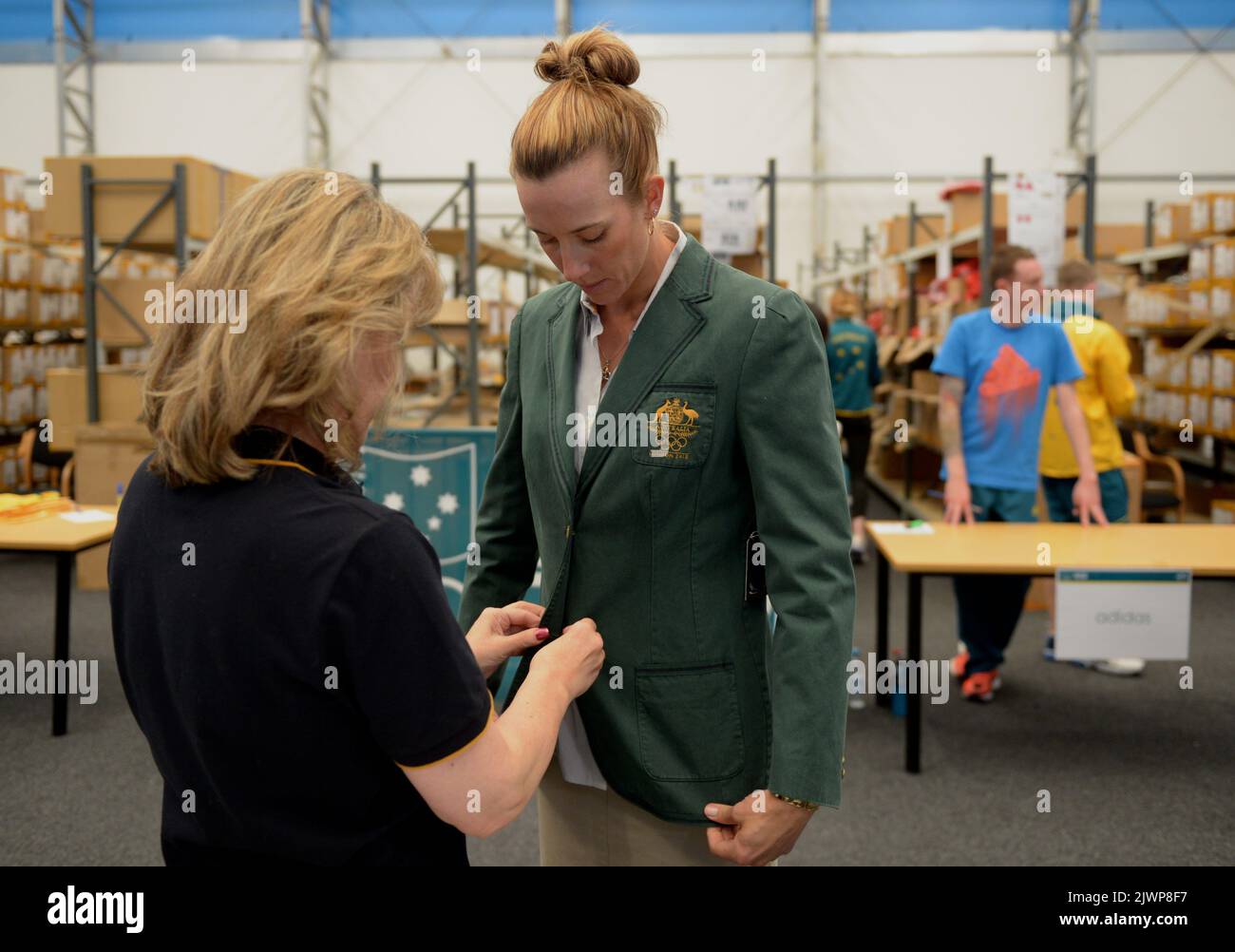 Australian women's beach volleyball player Louise Bawden gets fitted out with her team kit at