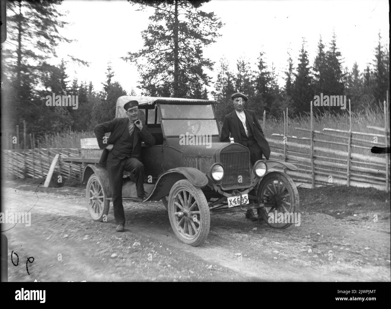 Car ride, the men unknown. Biltur, männen okända. Stock Photo