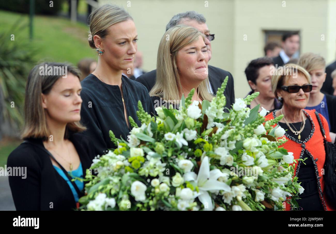 the-family-of-afl-player-john-mccarthy-grieve-after-the-funeral-of-the-afl-player-at-st-marys-star-of-the-sea-catholic-church-in-sorrento-south-of-melbourne-thursday-sept-20-2012-mccarthy-died-whilst-on-holiday-in-las-vegas-last-week-aap-imagejulian-smith-no-archiving-strictly-editorial-use-only-2JWPJWY.jpg