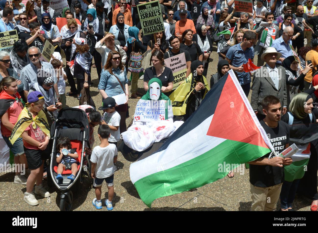 Hundreds of protesters join a proPalestine rally at Town Hall in