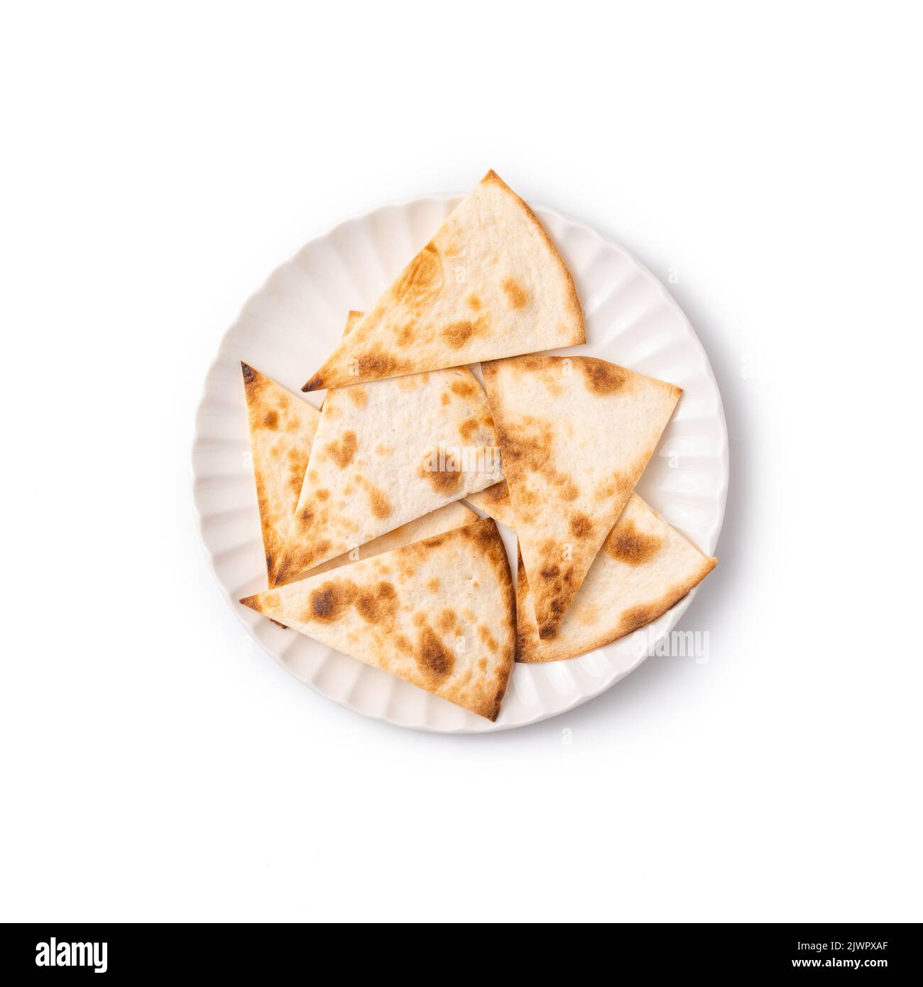 Pita bread sliced into triangles isolated on white background, top view
