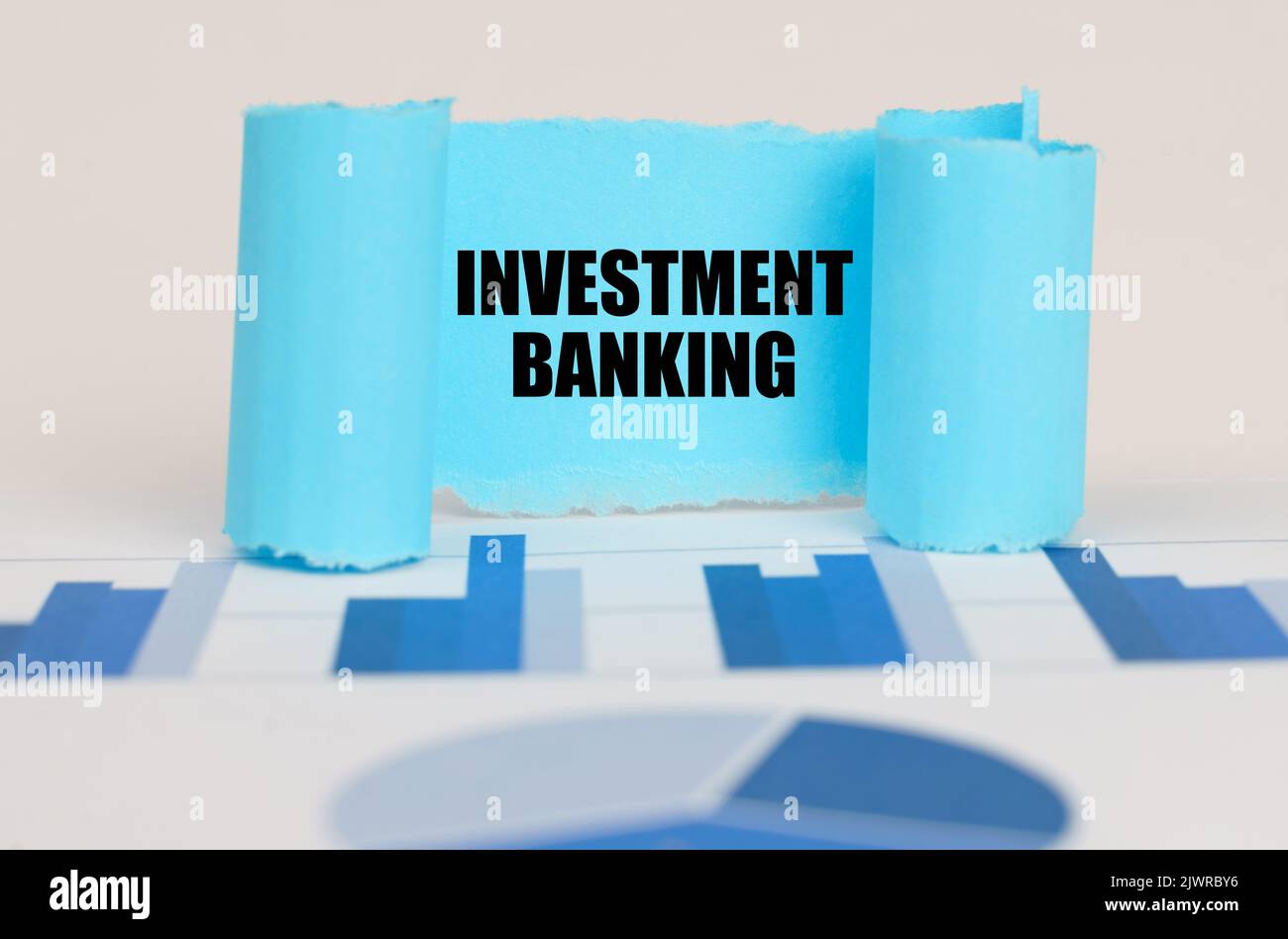 Business concept. On the blue diagram and graphs there is a twisted