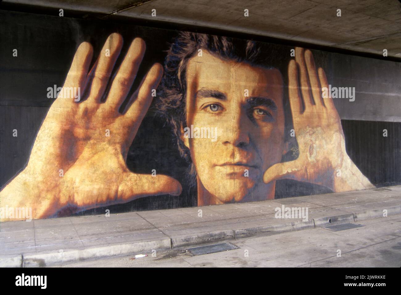 Art mural titled Jim Morphesis Monument painted by Kent Twitchell under freeway in downtown Los Angeles, CA Stock Photo