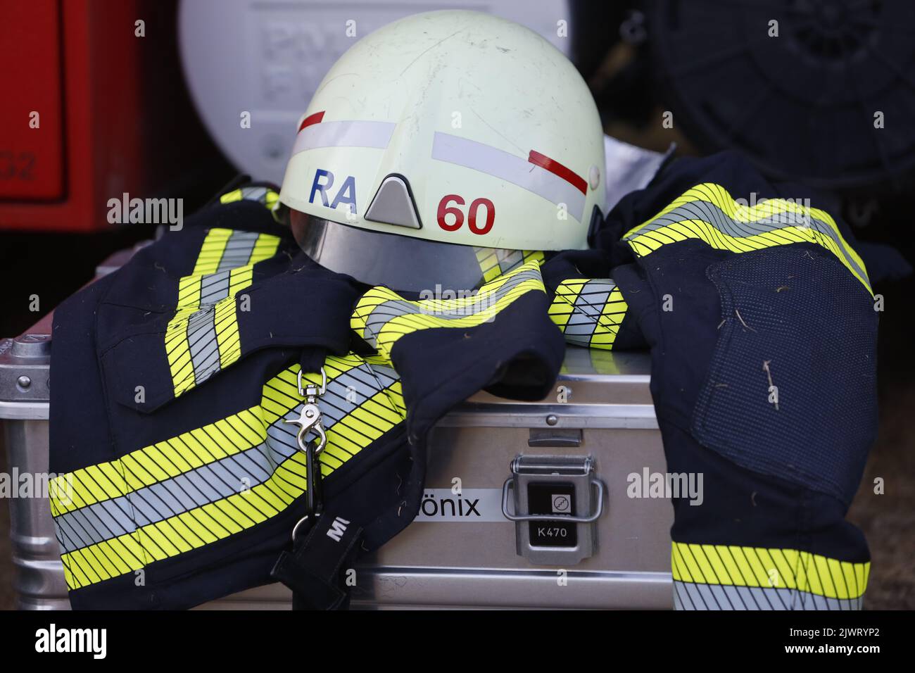 Elend, Germany. 06th Sep, 2022. Firefighters' turnout gear is lying on a crate. A large area of forest is still burning on the Brocken. Credit: Matthias Bein/dpa/Alamy Live News Stock Photo