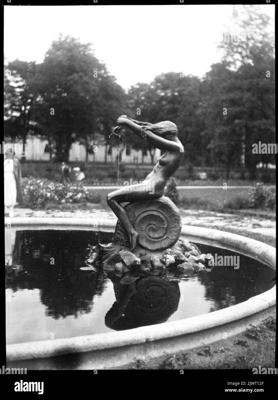 Unknown sculpture in a park, probably in Copenhagen. Okänd skulptur i en park, troligen i Köpenhamn. Stock Photo