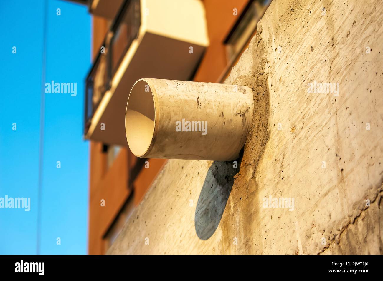 Extract from the pipe on the wall of the house. Preparing your home for