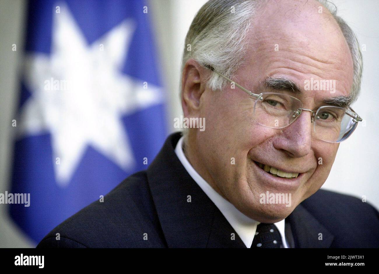 PA PHOTOS / AAP UK USE ONLY Prime Minister John Howard gives
