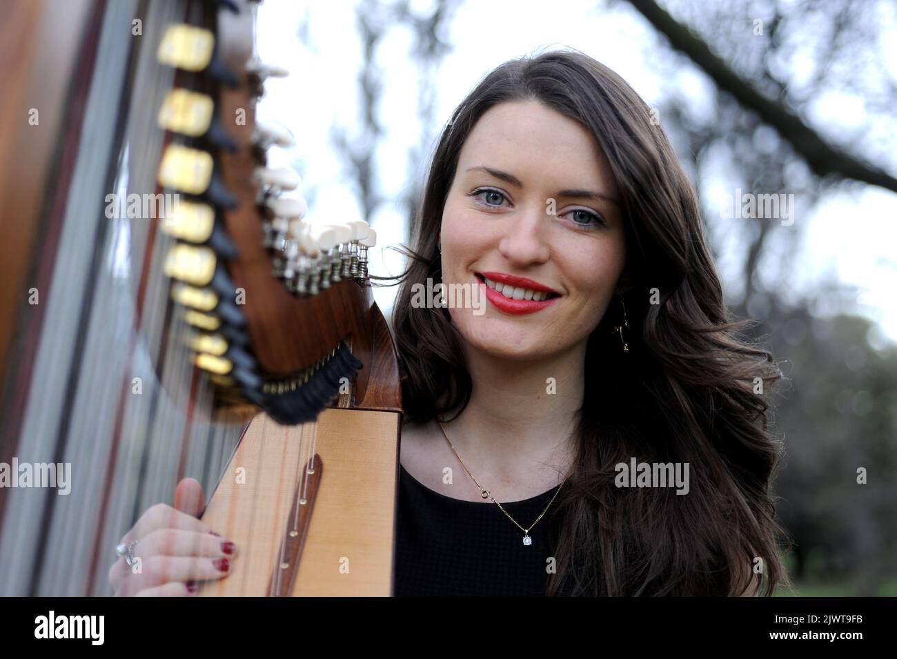 Singer and Harp player Alana Conway poses for a photograph in Melbourne