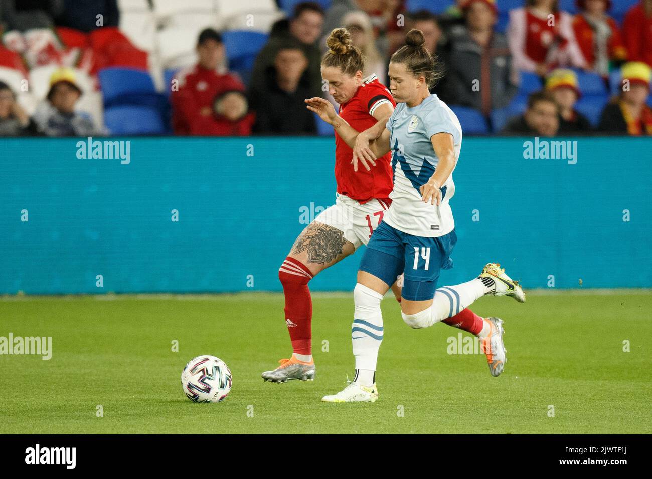 Cardiff, UK. 6th Sep, 2022. Georgia Walters of Wales and Špela Kolbl of Slovenia compete during the Wales v Slovenia Women's World Cup Qualification match. Credit: Gruffydd Thomas/Alamy Live News Stock Photo