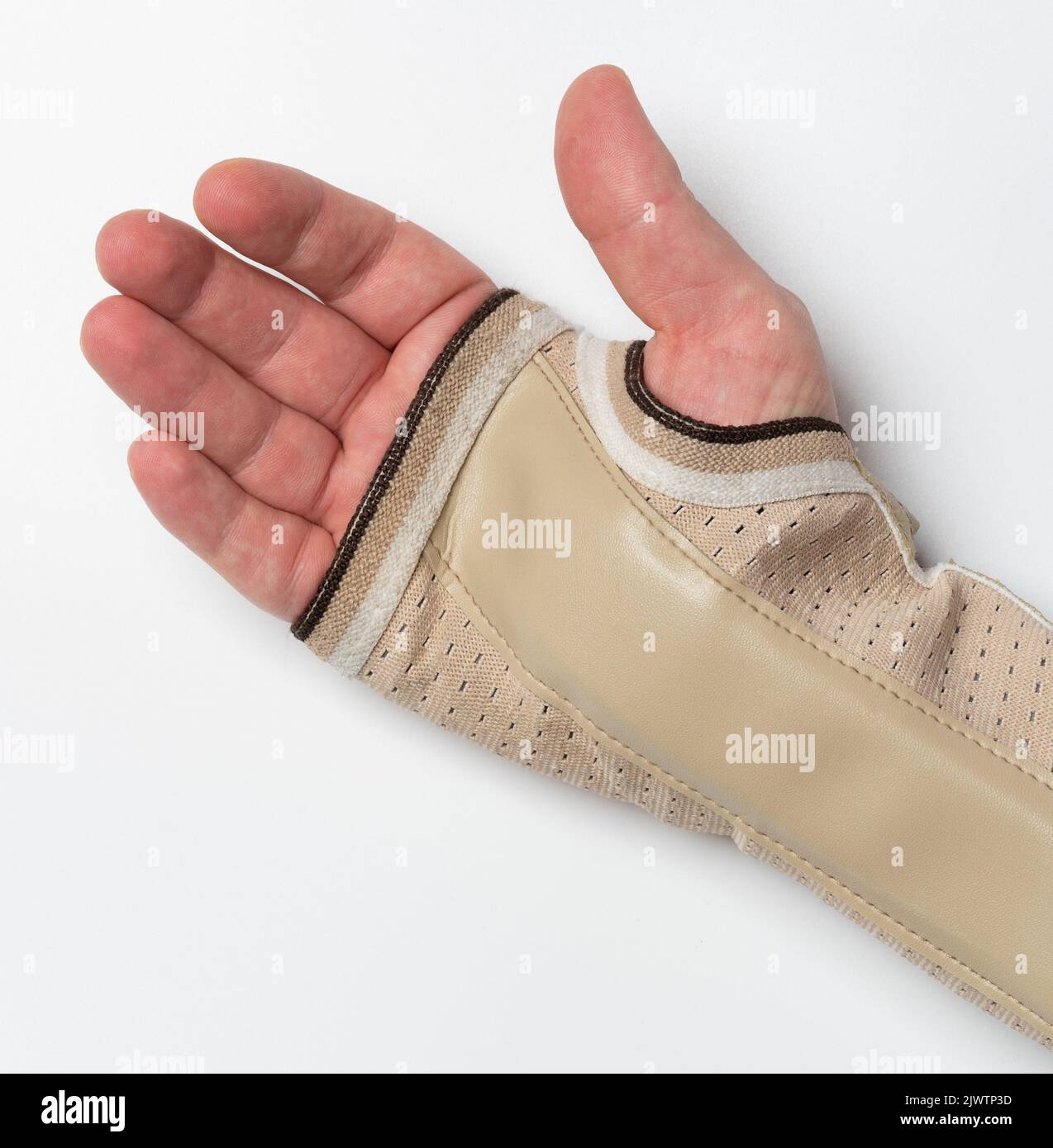 Open hand palm with bandage for fixing and healing hurt trauma isolated on white studio background Stock Photo