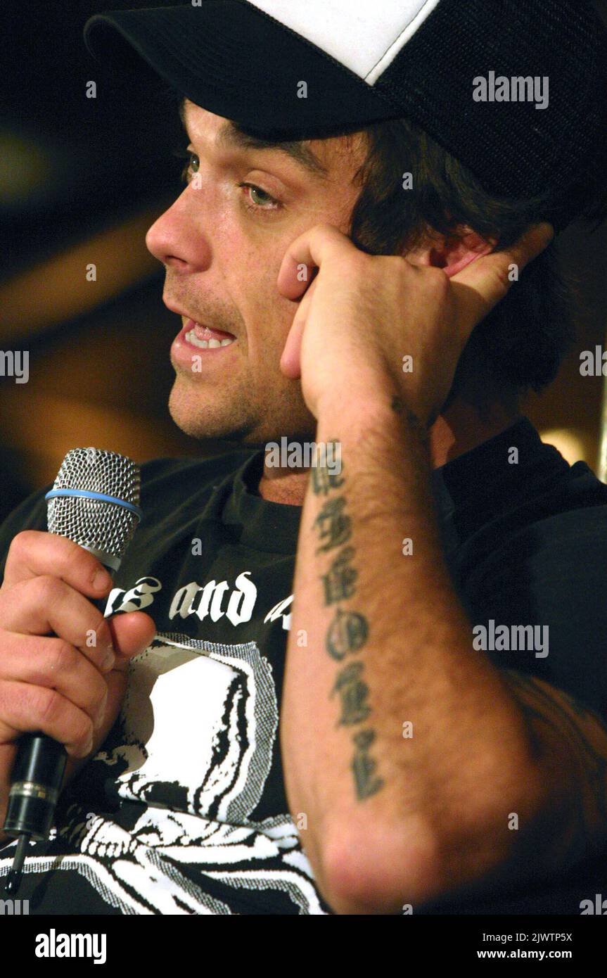 British singer Robbie Williams during a press conference at the Spearmint Rhino, a gentleman