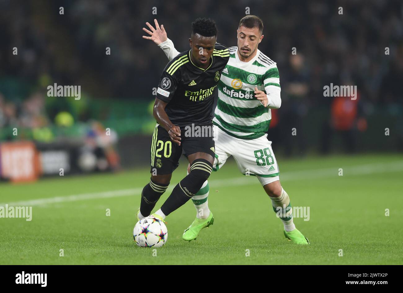 Glasgow, UK. 6th Sep, 2022. Vin'cius Jœnior of Real Madrid and Josip Juranovic of Celtic during the UEFA Champions League Group F match at Celtic Park, Glasgow. Picture credit should read: Neil Hanna/Sportimage Credit: Sportimage/Alamy Live News Stock Photo