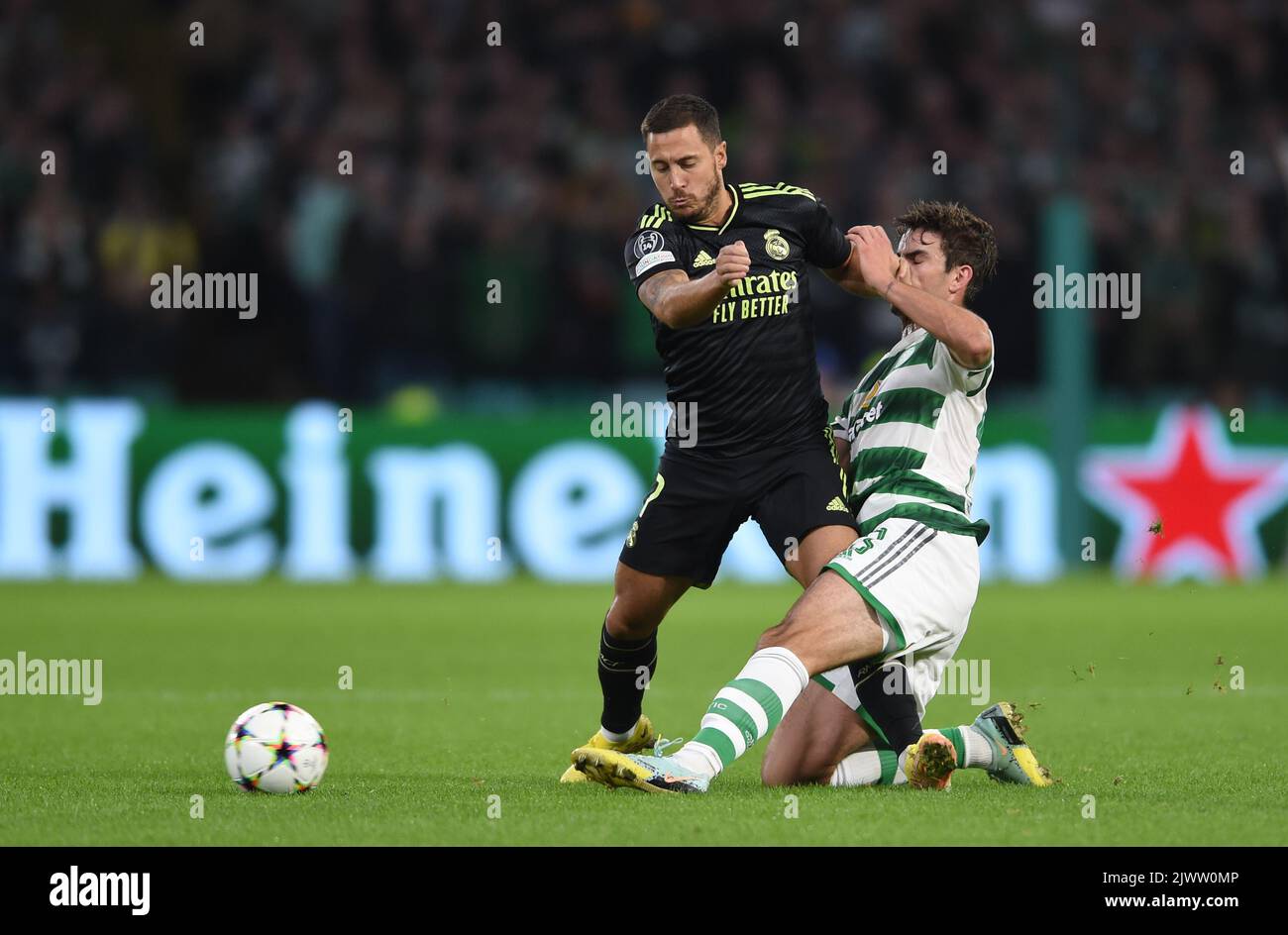 Glasgow, UK. 6th Sep, 2022. Eden Hazard of Real Madrid and Matt O'Riley of Celtic during the UEFA Champions League Group F match at Celtic Park, Glasgow. Picture credit should read: Neil Hanna/Sportimage Credit: Sportimage/Alamy Live News Stock Photo