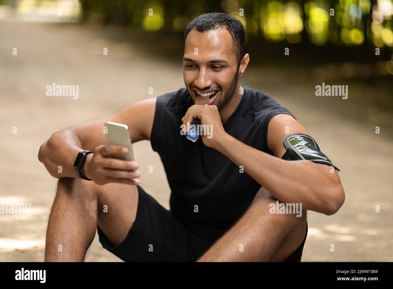 Black athlete eating a healthy snack hi-res stock photography and ...