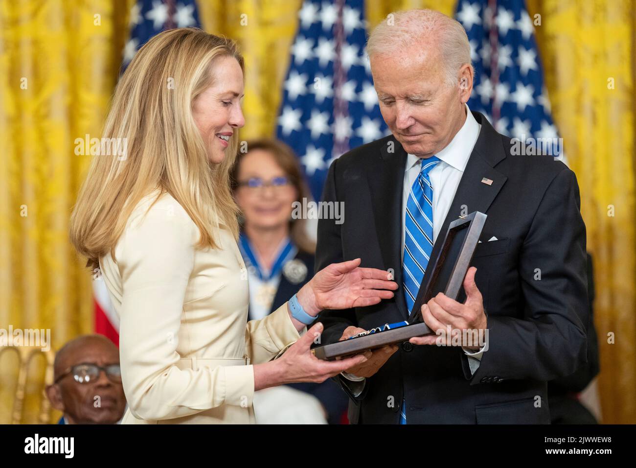 President Joe Biden presents the Medal of Freedom for Steve Jobs to Laurene Powell Jobs, Thursday, July 7, 2022, in the East Room of the White House. (Official White House Photo by Adam Schultz) Stock Photo