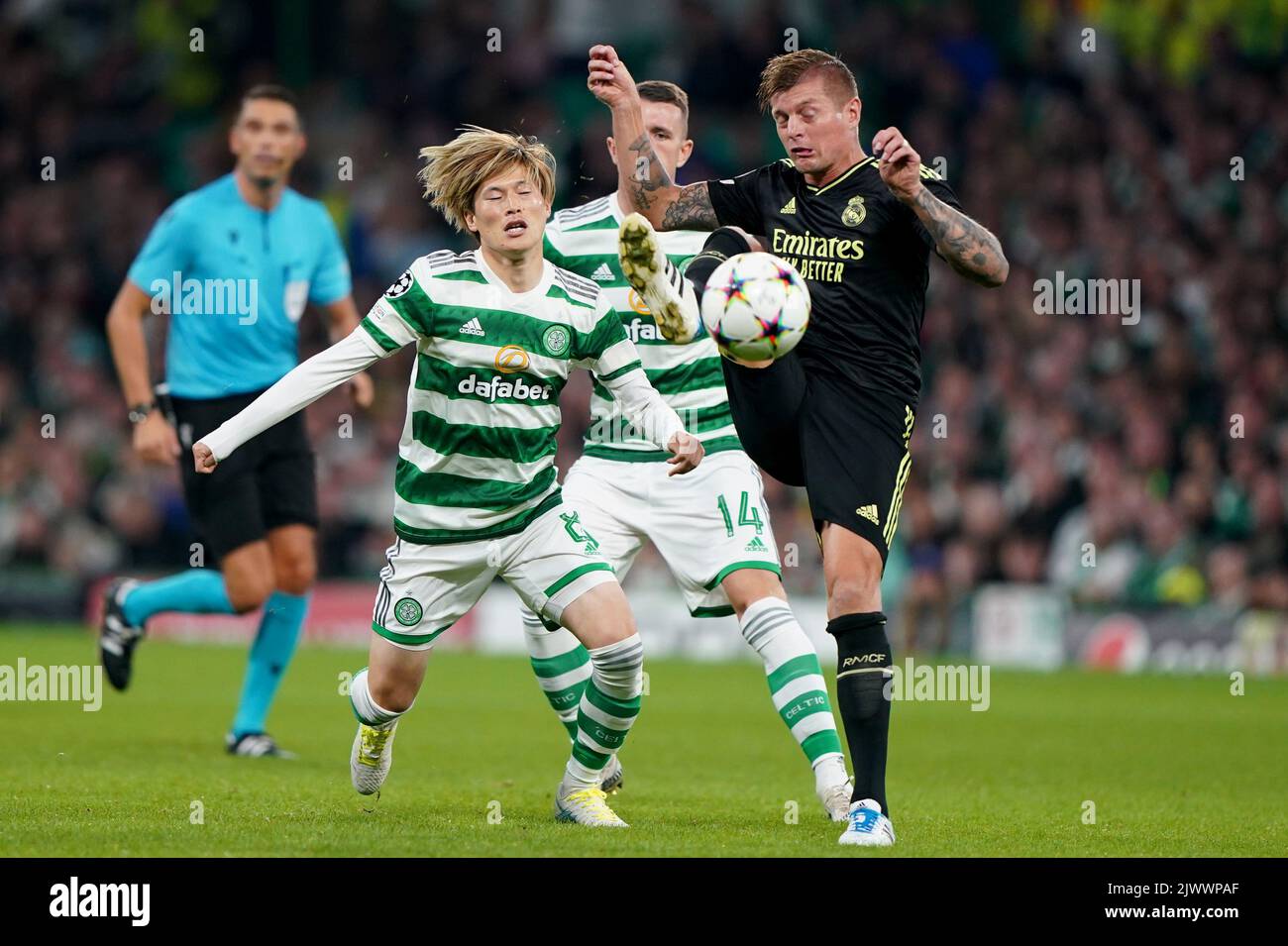 Celtic’s Kyogo Furuhashi and Real Madrids’s Toni Kroos in action during the UEFA Champions League Group F match at Celtic Park, Glasgow. Picture date: Tuesday September 6, 2022. Stock Photo