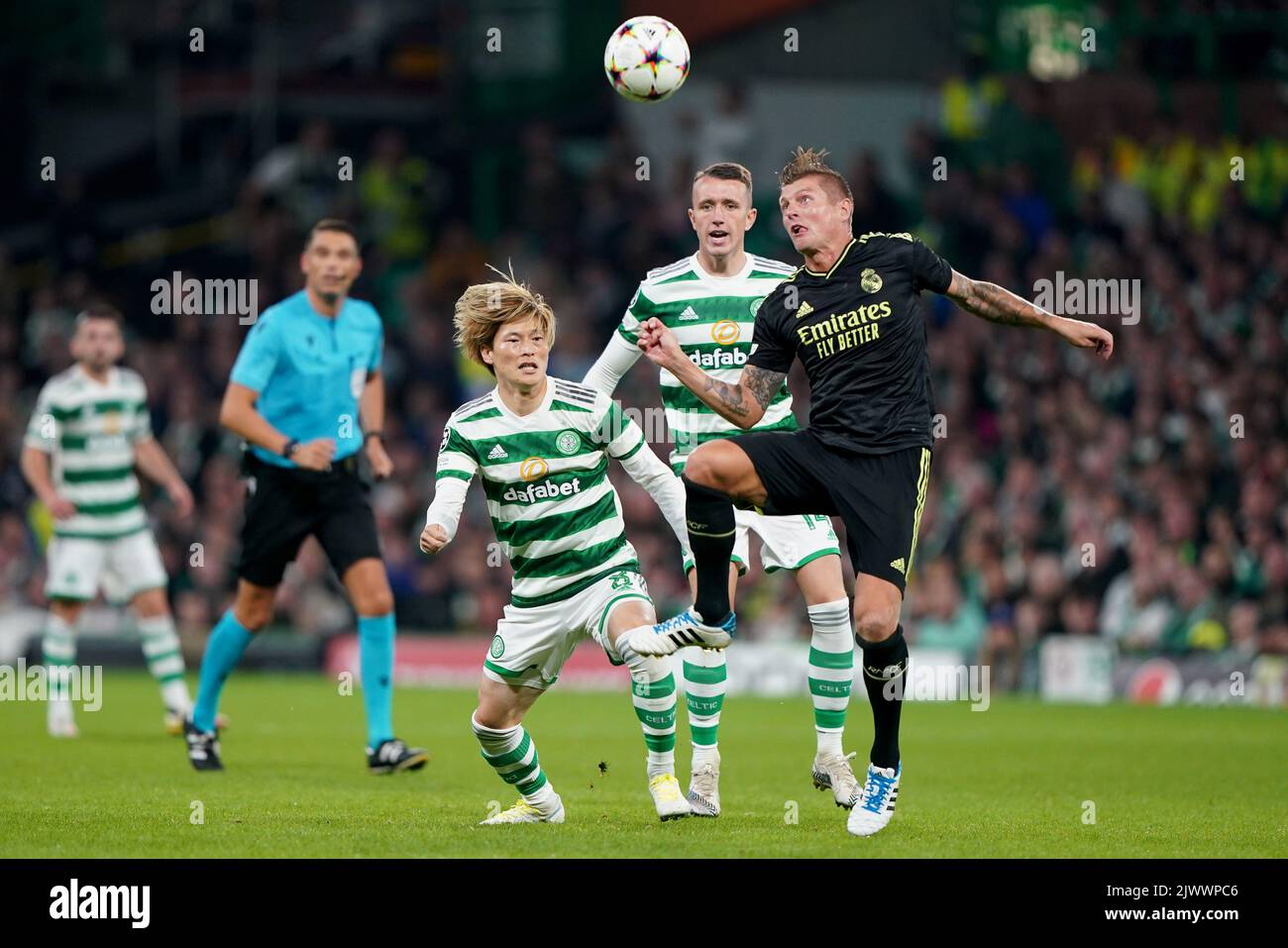 Celtic’s Kyogo Furuhashi and Real Madrids’s Toni Kroos in action during the UEFA Champions League Group F match at Celtic Park, Glasgow. Picture date: Tuesday September 6, 2022. Stock Photo