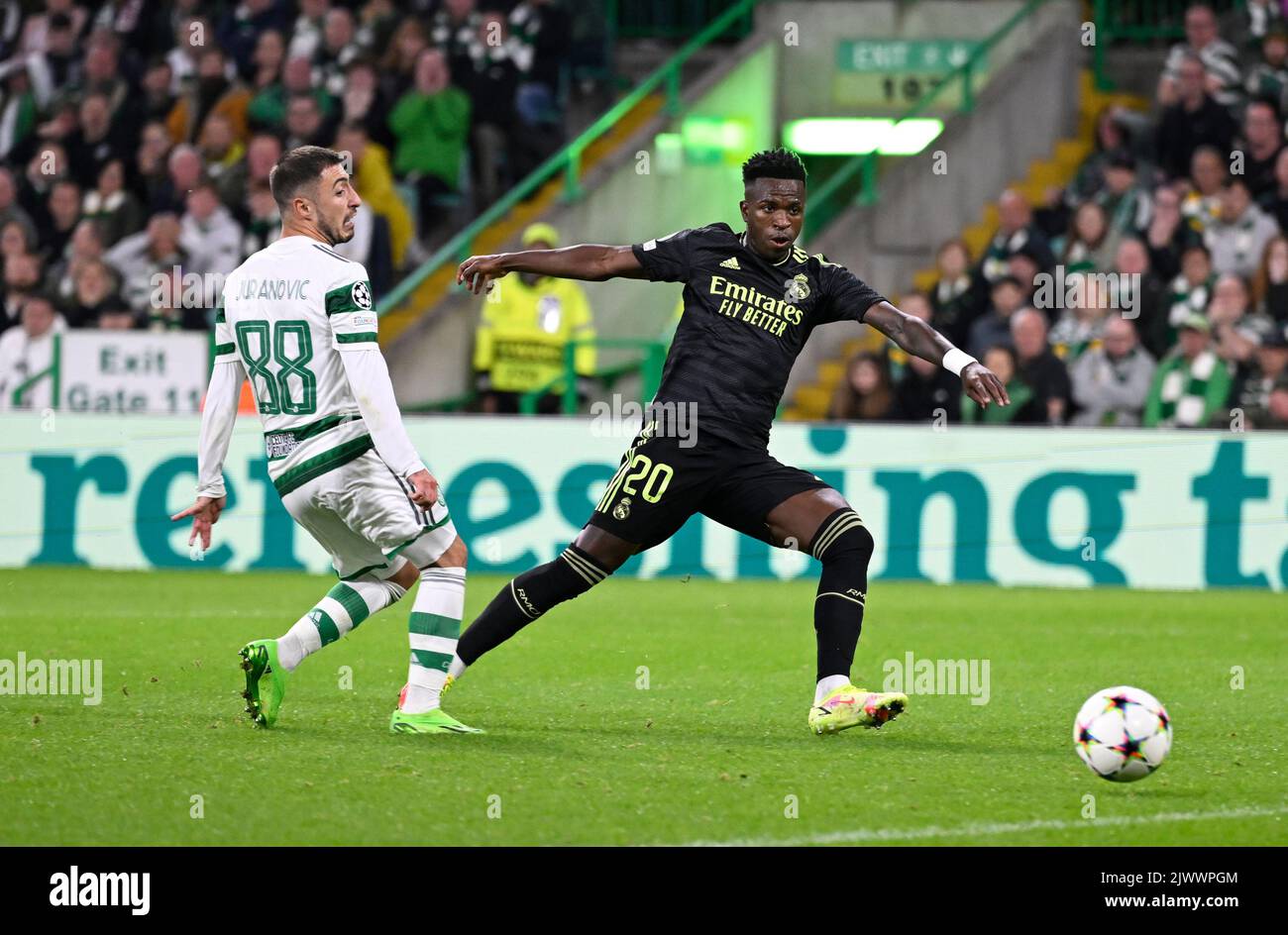 Glasgow, UK. 6th Sep, 2022. Vin'cius Jœnior of Real Madrid scores MadridÕs first goal despite Josip Juranovic of Celtic during the UEFA Champions League Group F match at Celtic Park, Glasgow. Picture credit should read: Neil Hanna/Sportimage Credit: Sportimage/Alamy Live News Stock Photo