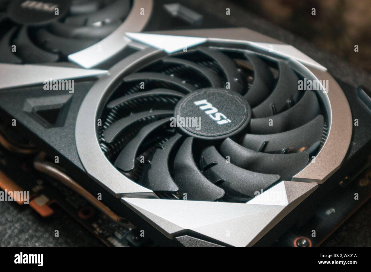 Kyiv, Ukraine - August 19, 2022: Cooler on MSI graphics card with AMD Radeon RX6700XT, close-up with selective focus, PC equipment details Stock Photo