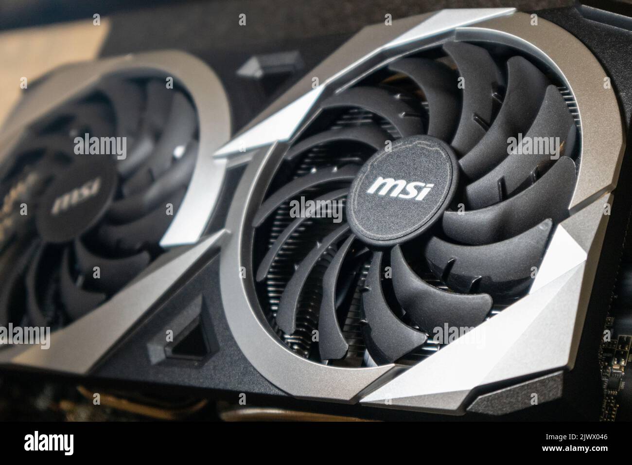 Kyiv, Ukraine - August 19, 2022: Fans of MSI graphics card with AMD Radeon RX6700XT, close-up with selective focus, PC hardware details Stock Photo