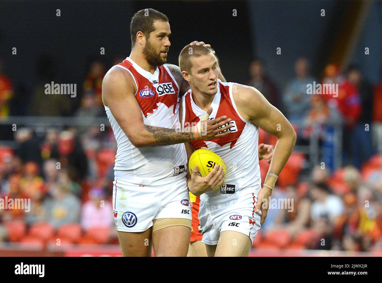 Swans player Lance Franklin reacts with Sam Ried after Reid took a mark ...