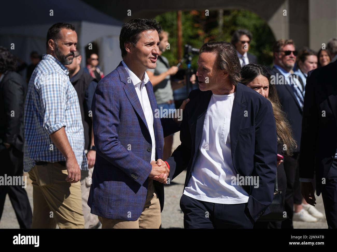 Real estate developer Ian Gillespie, right, founder of Westbank, talks