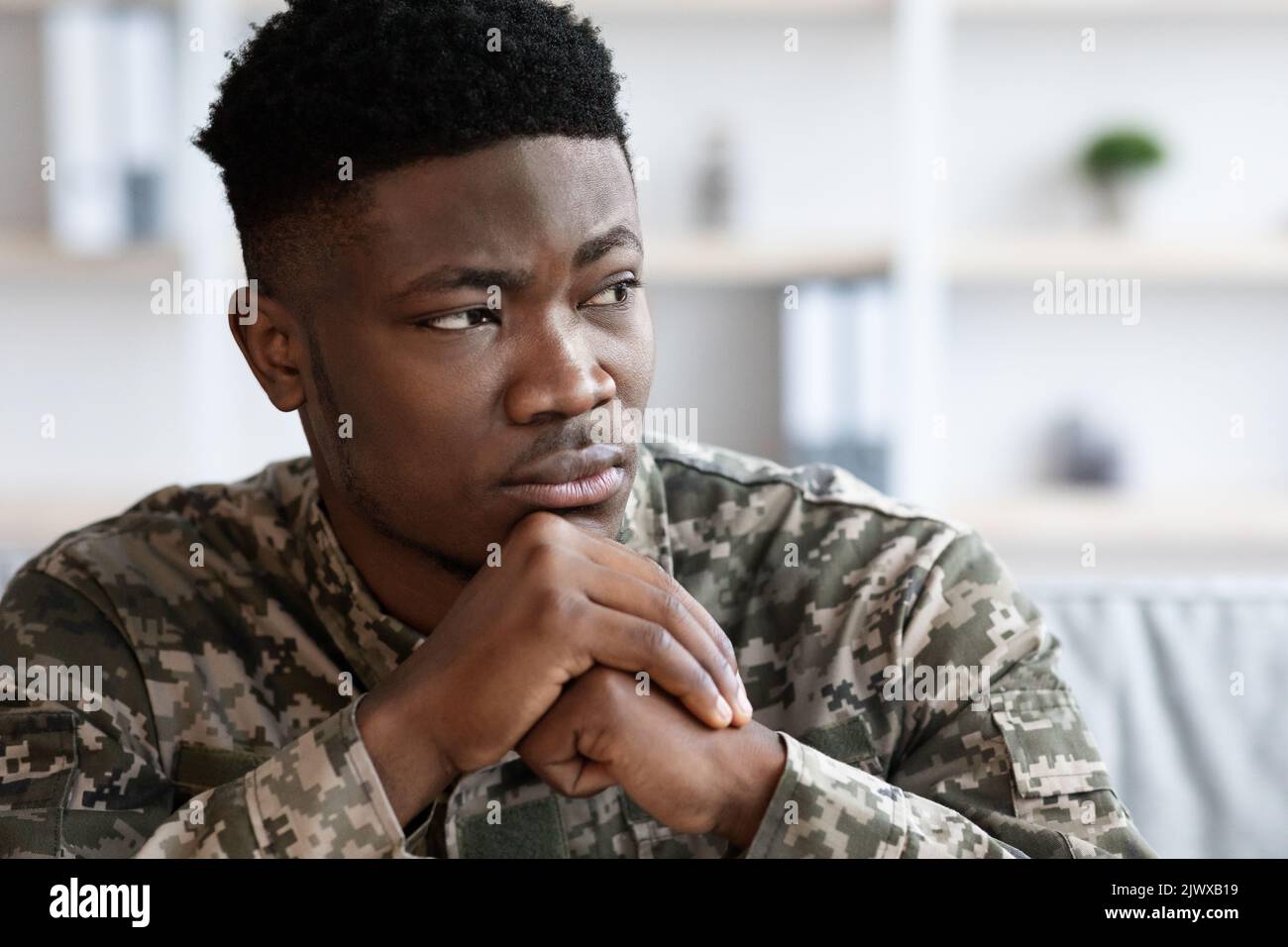 Serious african american man soldier looking at copy space Stock Photo