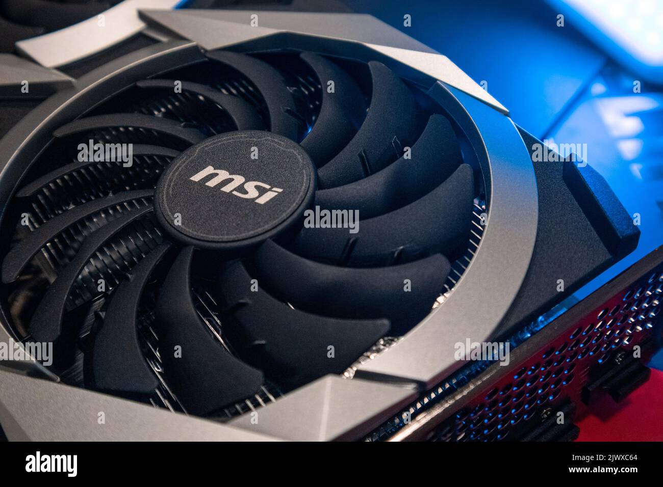 Kyiv, Ukraine - August 19, 2022: Cooler in blue light, MSI graphics card with AMD Radeon chipset, close-up with selective focus, computer equipment Stock Photo