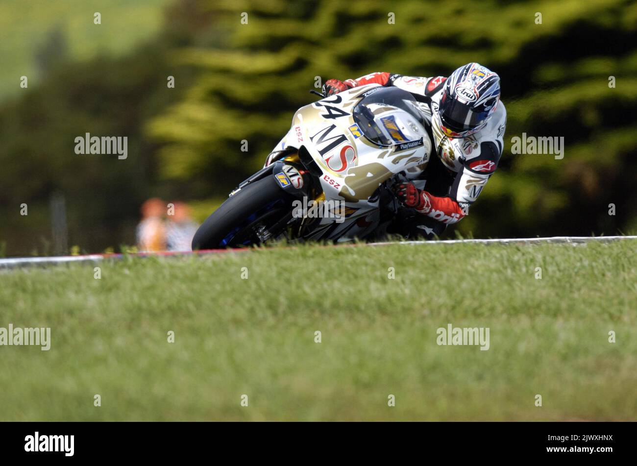 Australian Garry McCoy powers through turn eight during qualifying for ...