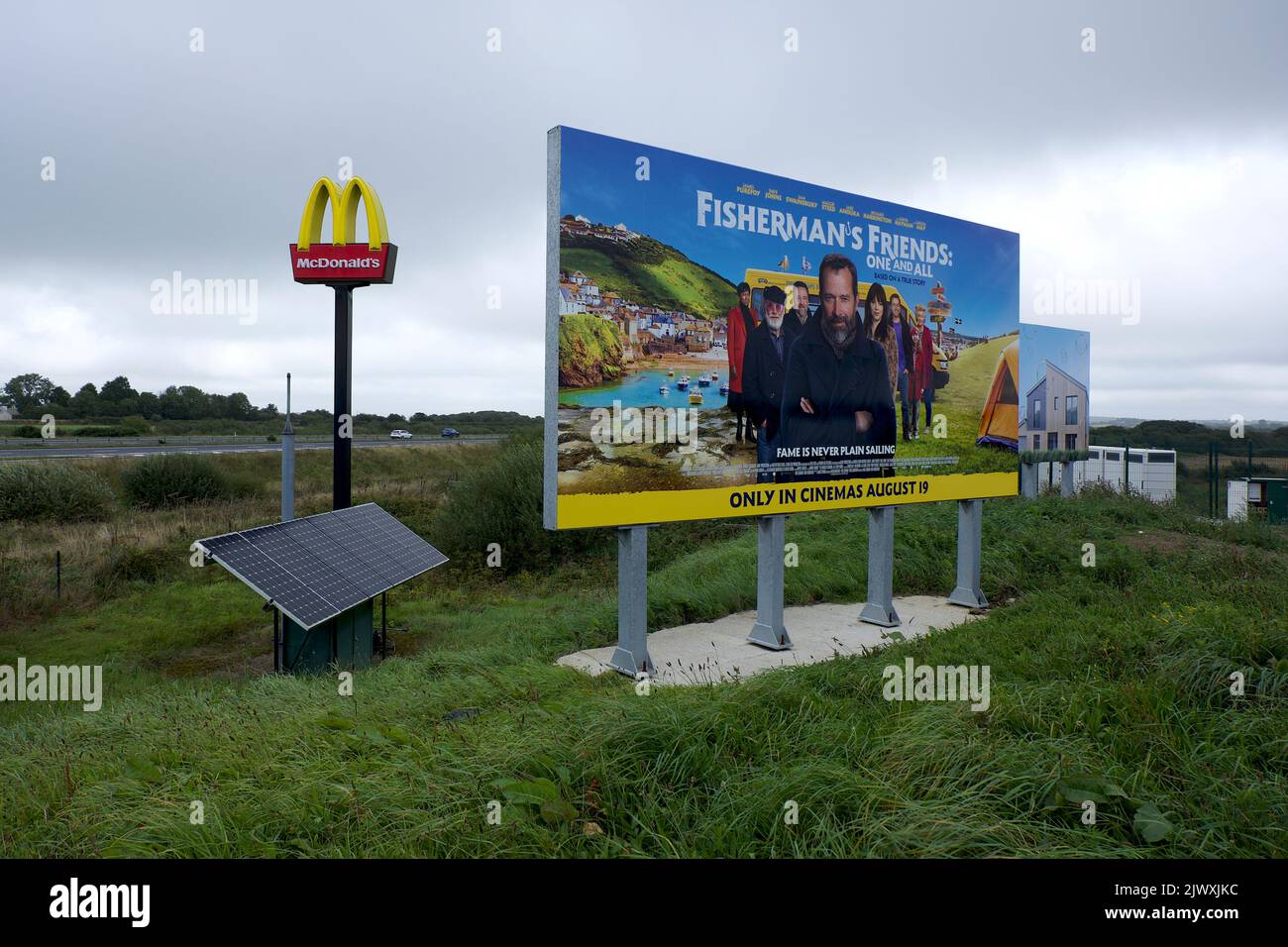 Victoria Roche St Austell England 09 05 2022 billboard A30 motorway services Fishermans friend's musical group film about Cornwall Stock Photo