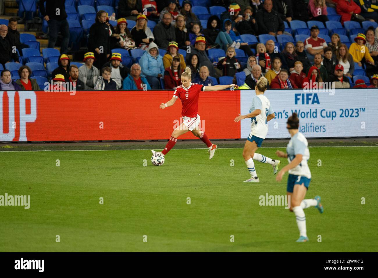 Cardiff, UK. 6th Sep, 2022. Rhiannon Roberts of Wales crosses the ball during the Wales v Slovenia Women's World Cup Qualification match. Credit: Gruffydd Thomas/Alamy Live News Stock Photo