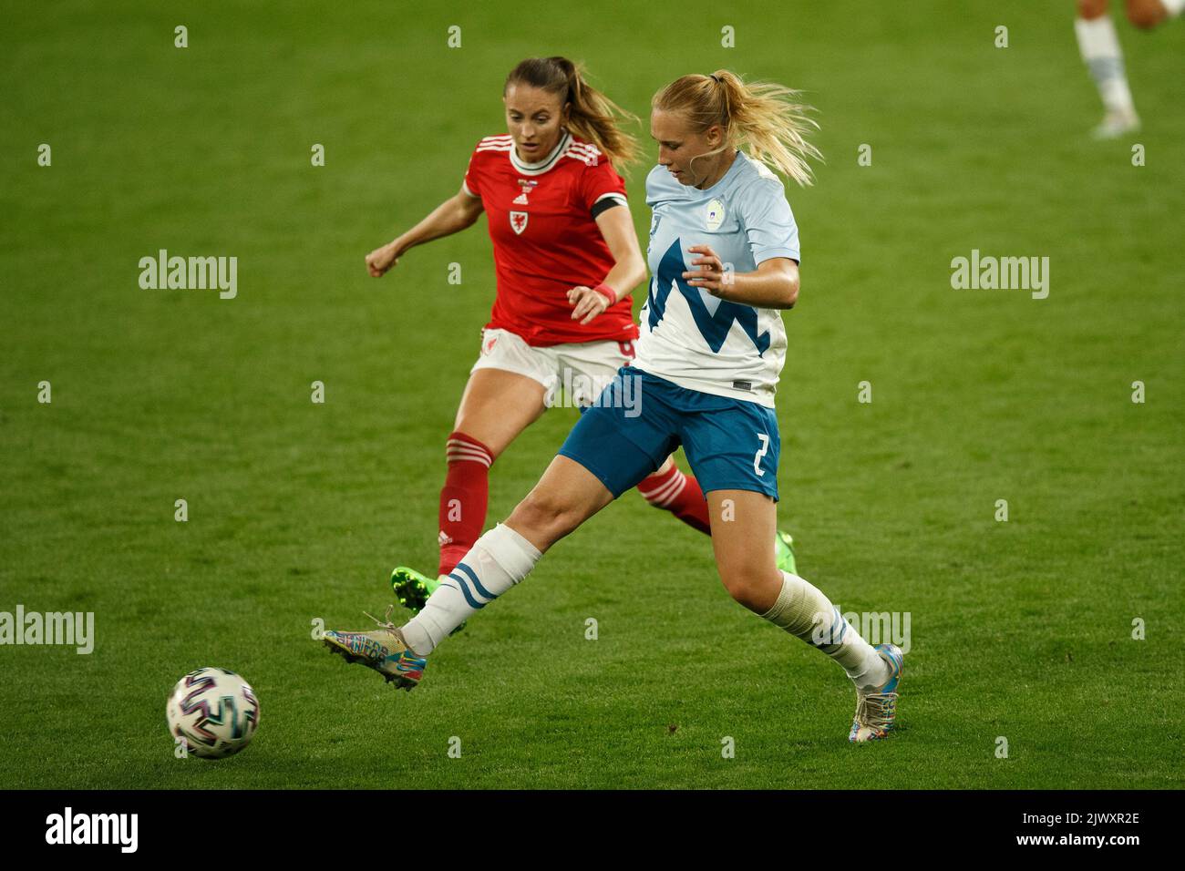Cardiff, UK. 6th Sep, 2022. Kayleigh Green of Wales and Lana Golob of Slovenia compete during the Wales v Slovenia Women's World Cup Qualification match. Credit: Gruffydd Thomas/Alamy Live News Stock Photo