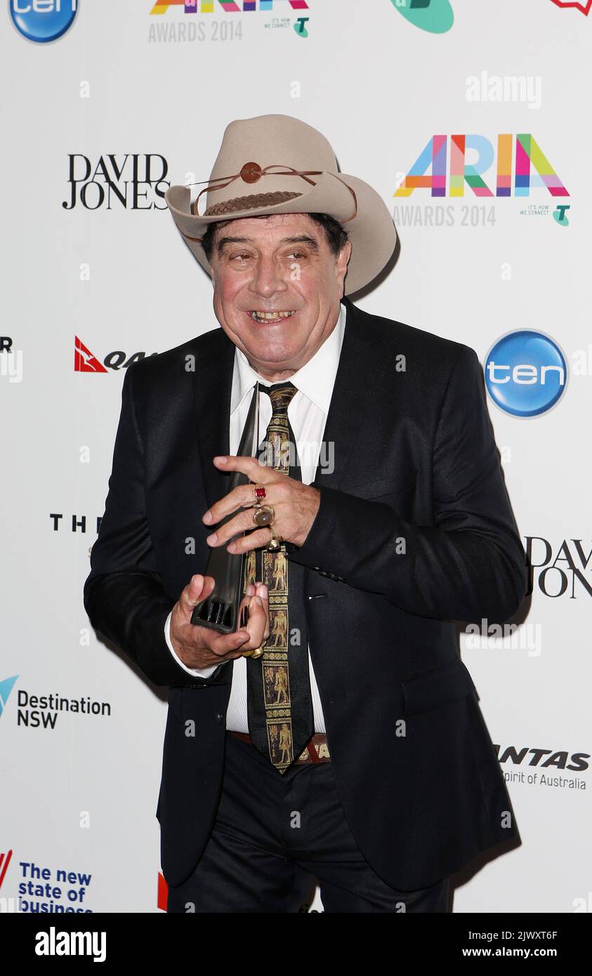 Molly Meldrum poses for a photograph after being inducted into the ARIA
