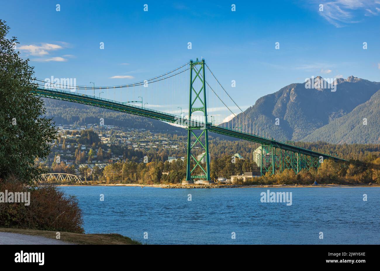 Lions Gate Bridge in summer day, Vancouver, BC, Canada. View of Lions Gate Bridge from Stanley Park. Built in the 1930s, Vancouver's Lions Gate Bridge Stock Photo