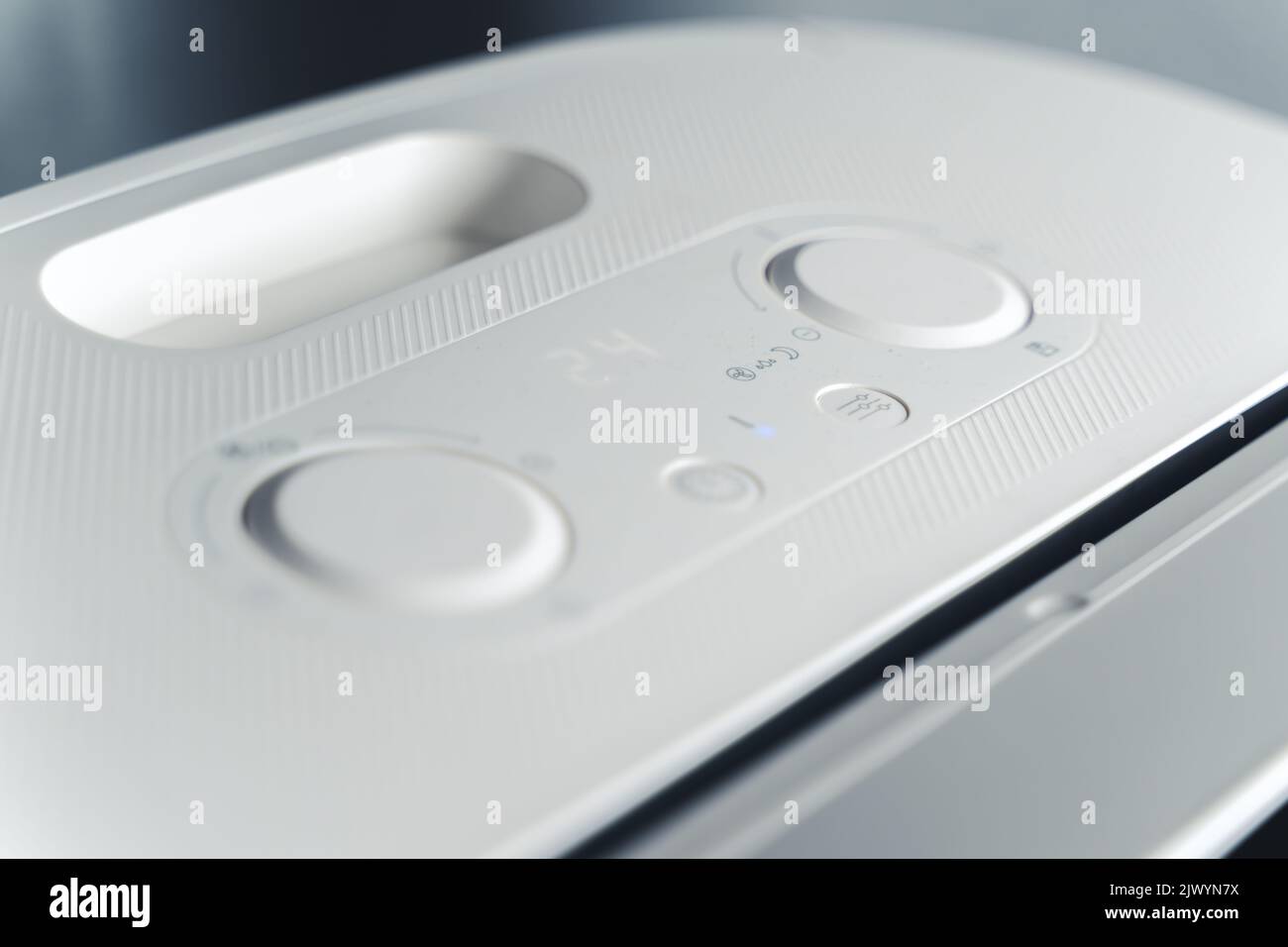 Closeup white air conditioner control panel for the apartment and office. High quality photo