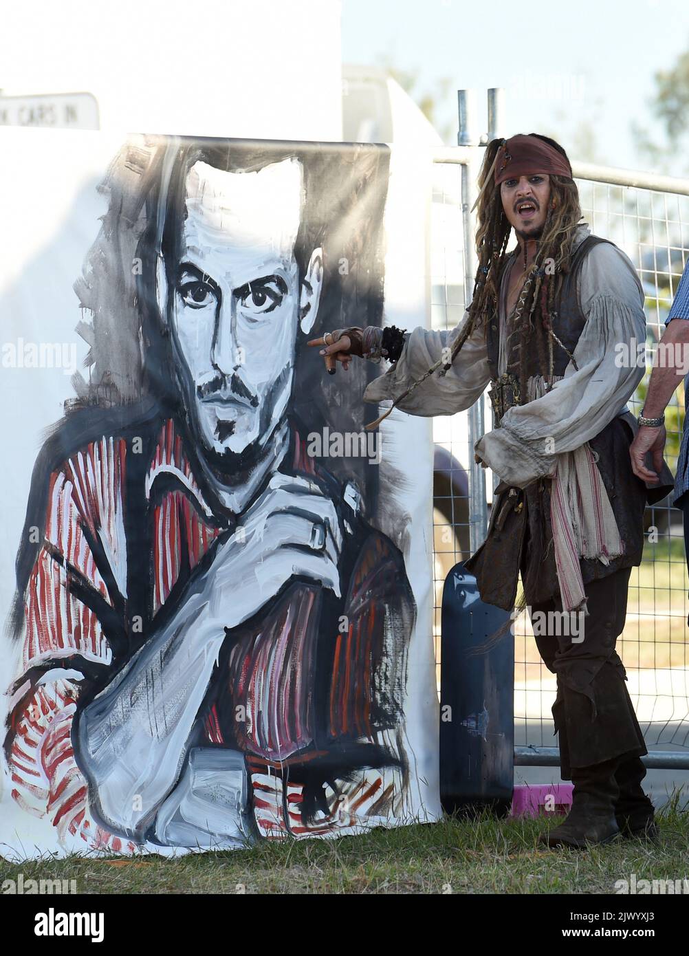 Hollywood actor Johnny Depp, seen in costume as Captain Jack Sparrow, reacts after seeing a