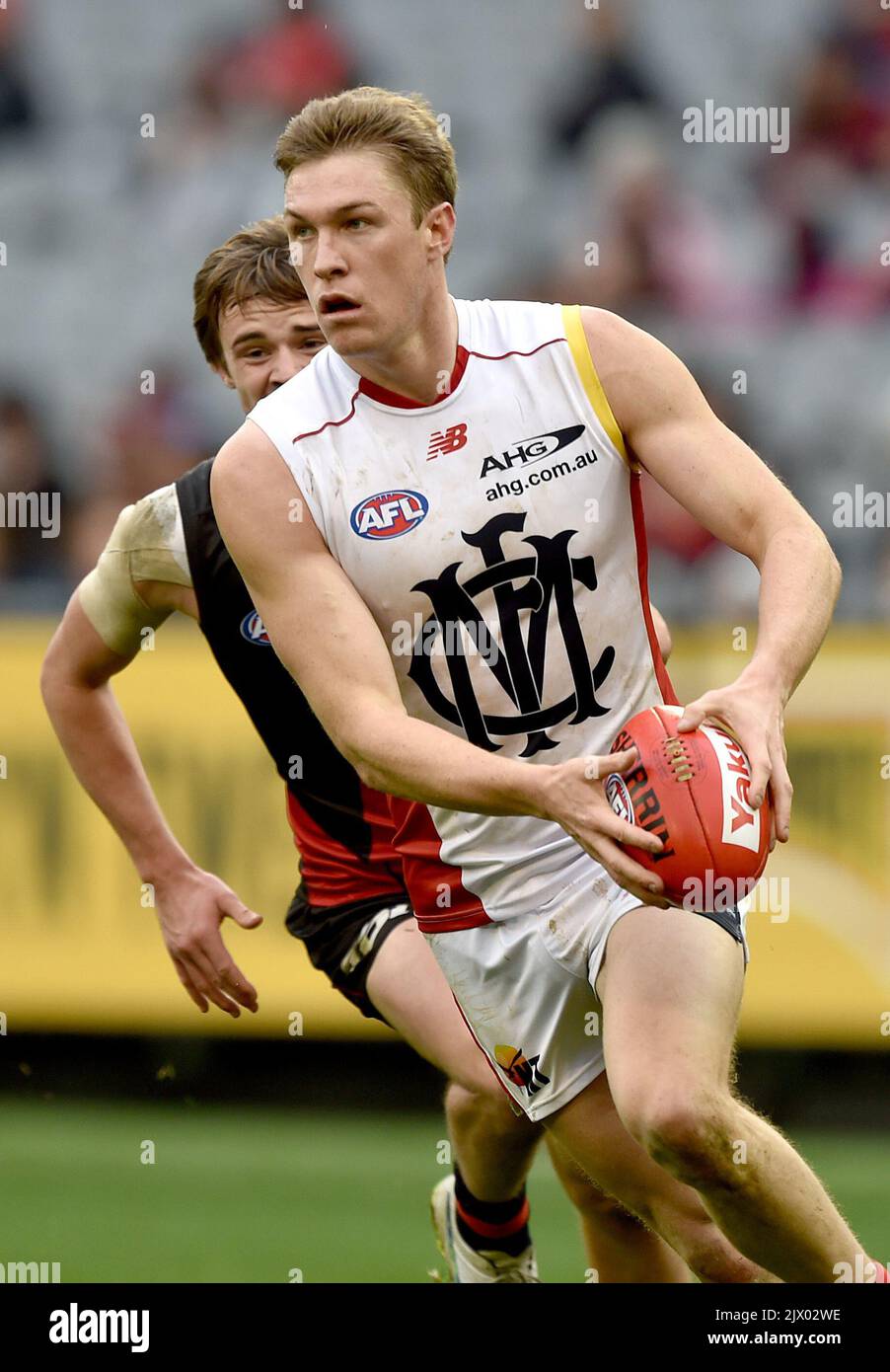 Tom Ropes Mcg Tom McDonald of the Demons runs with the ball, during the round 15 AFL ...