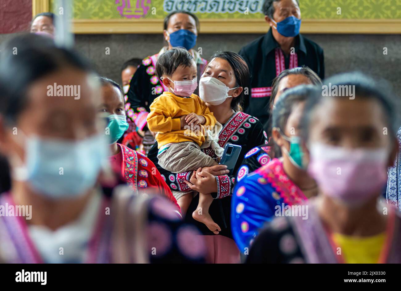 Chiang Mai, Thailand. 05th Sep, 2022. A protester carrying a baby takes ...