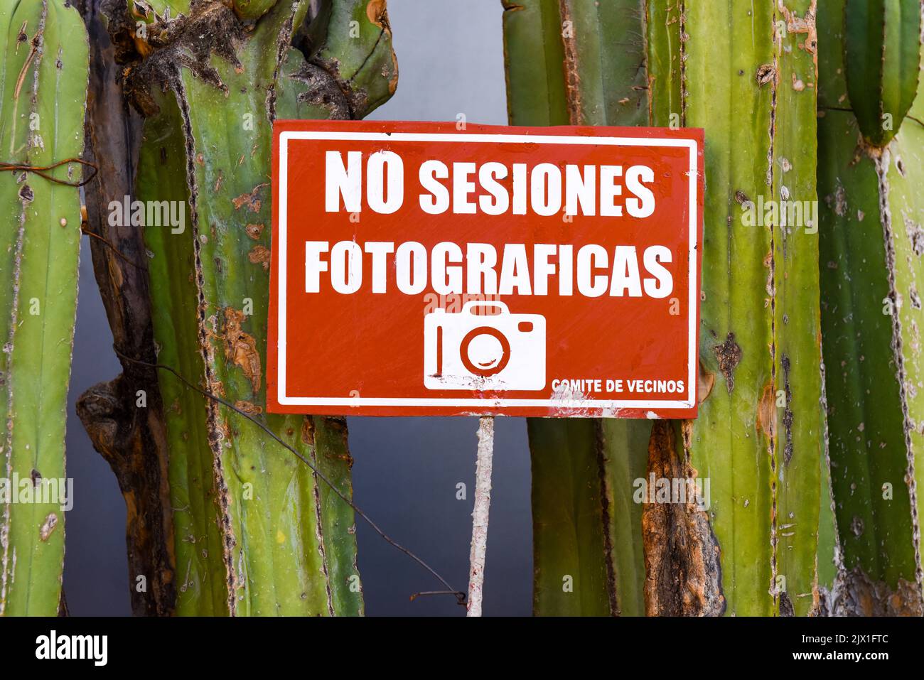Fed-up local residents put signs prohibiting photo sessions in some alleys of the historical center of Oaxaca de Juarez, Mexico Stock Photo