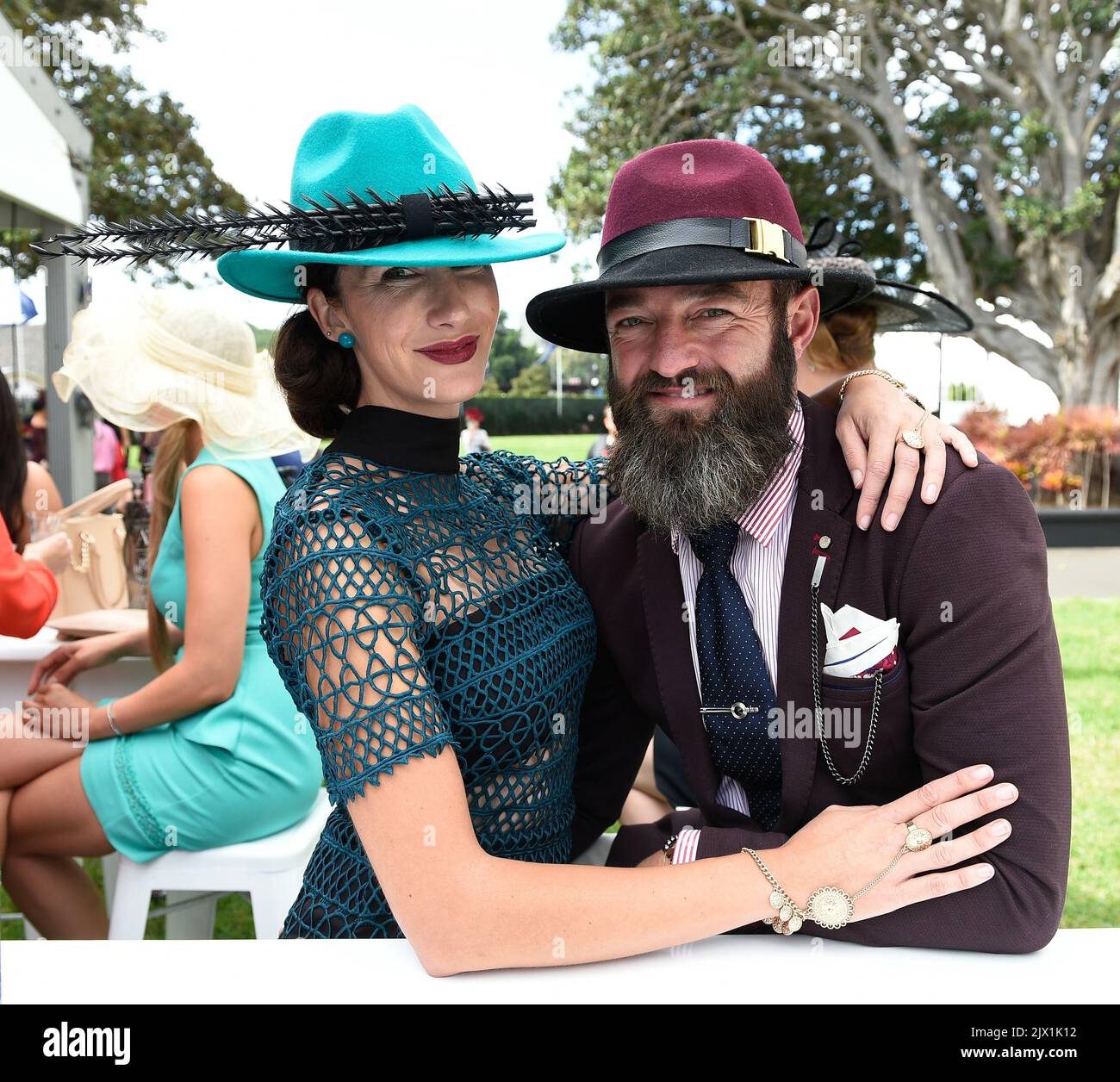 Brooke Strahan and Nathan Button pose for a photograph at the Myer Fashions  on the Field Marquee during 'The Championships Day 2 'Longines Queen  Elizabeth Day' as part of the Sydney Autumn