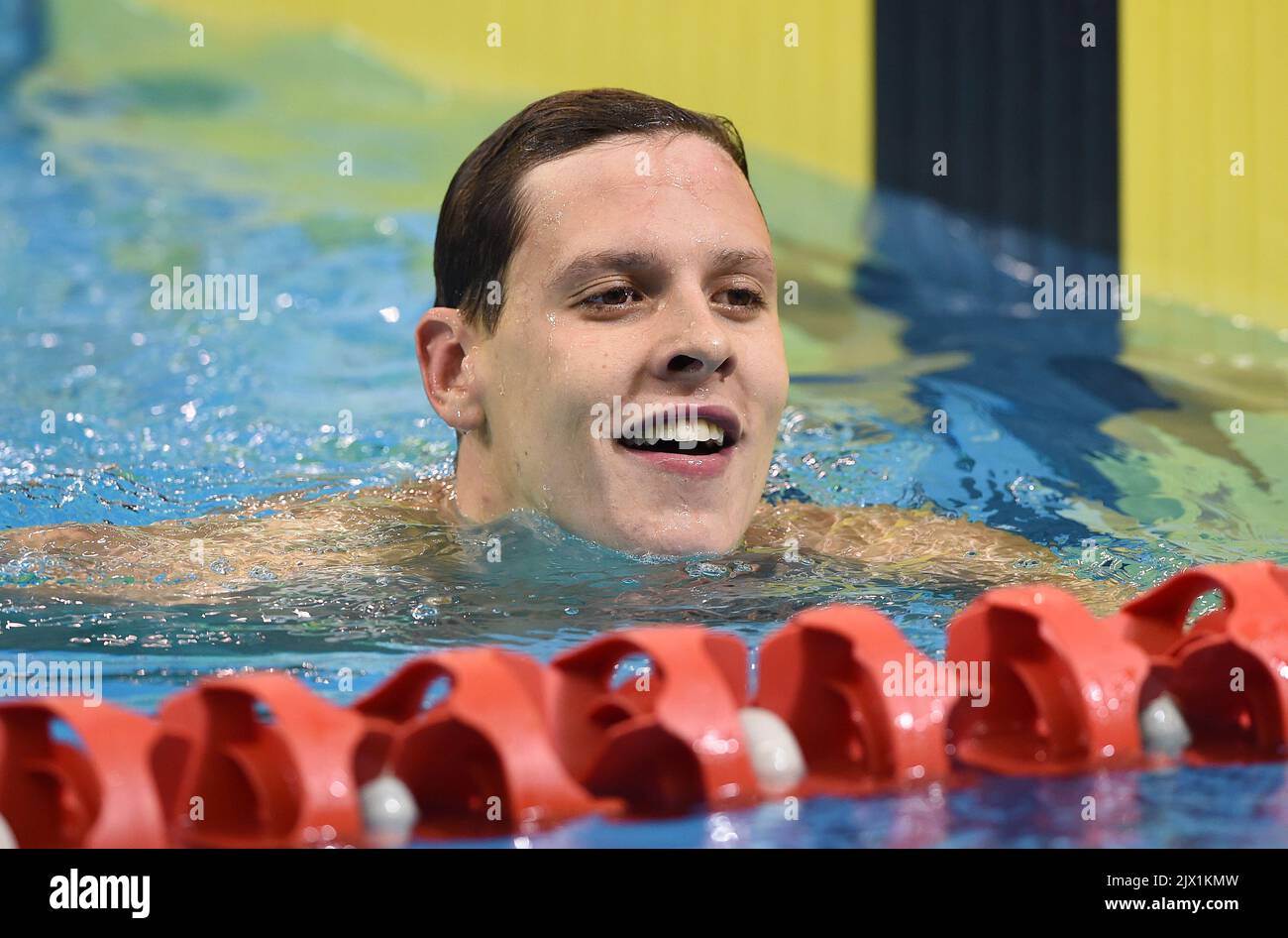 Mitch Larkin smiles after winning the Mens 50m Backstroke Final on day ...