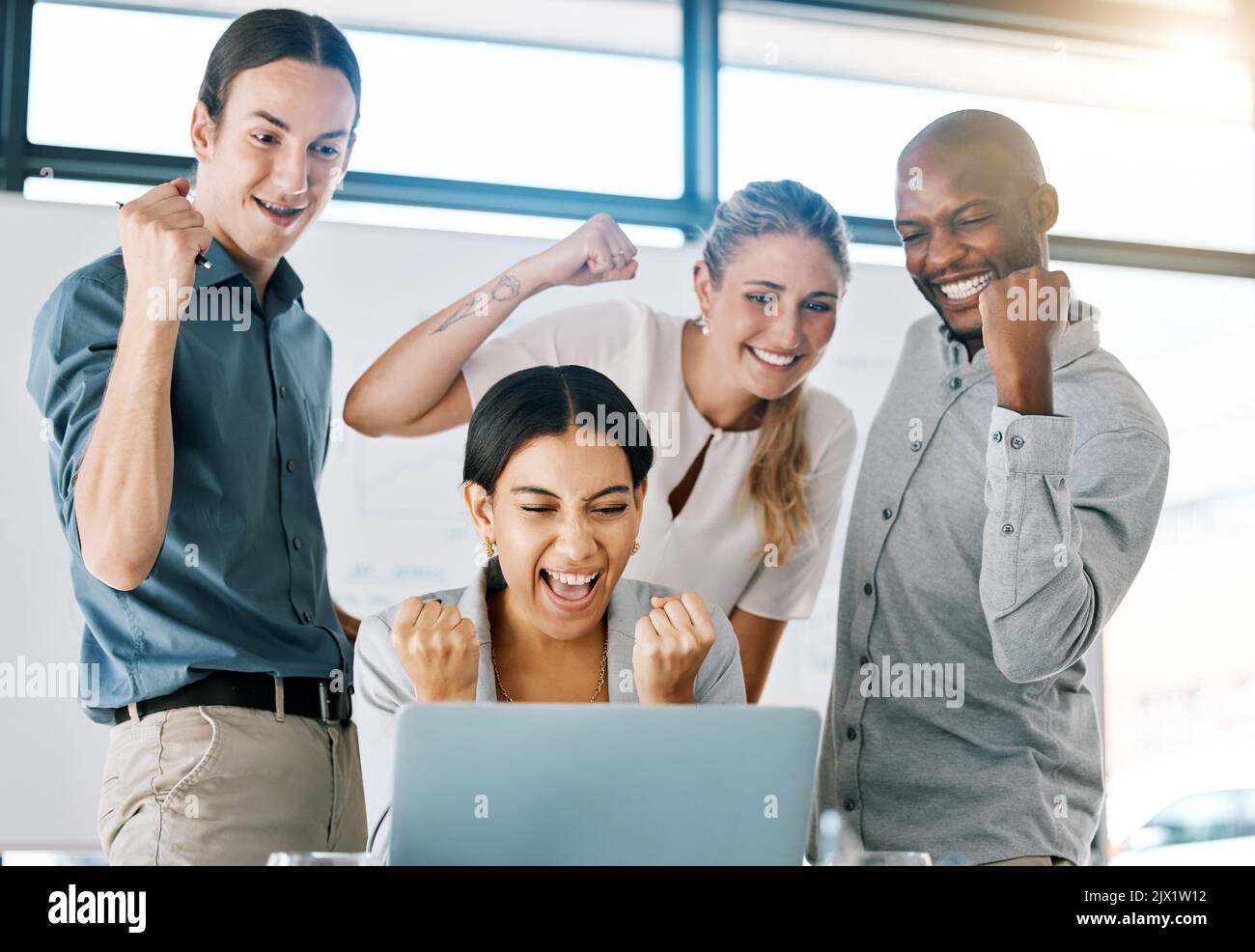 Winning results, fist pump and celebration business people with laptop