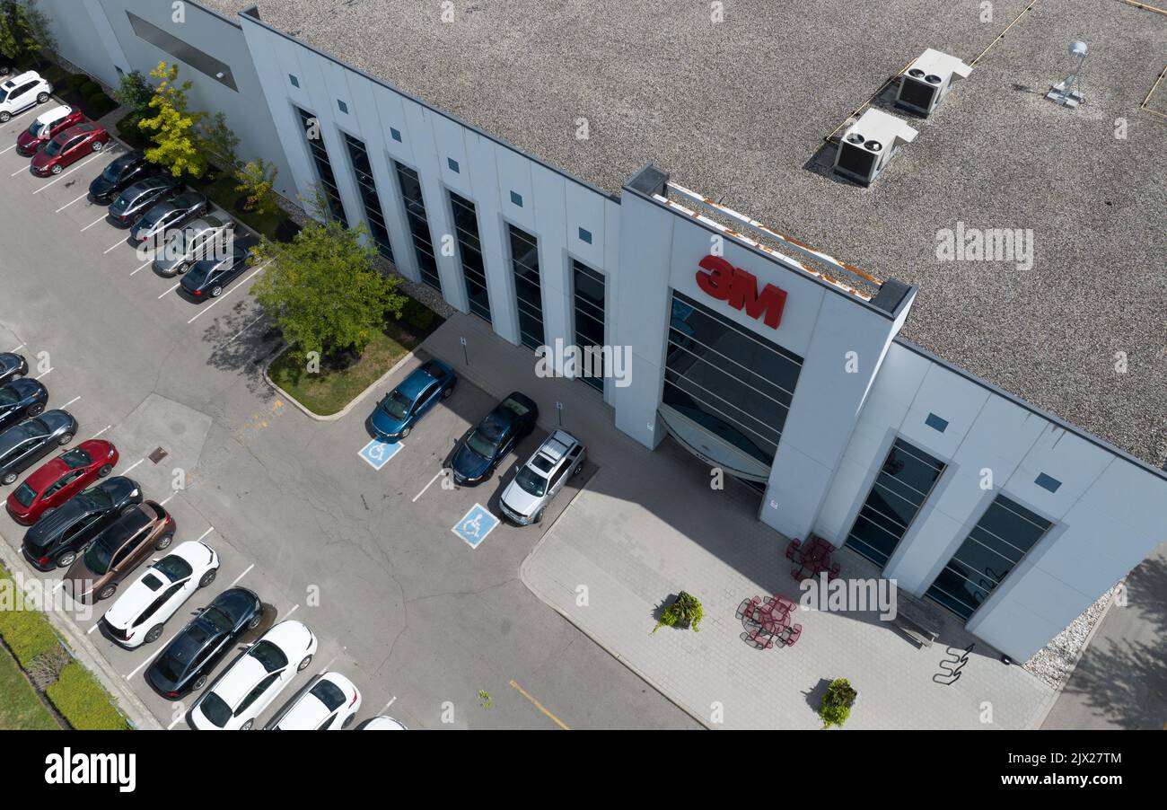 An aerial photo high above a 3M office building seen during the day