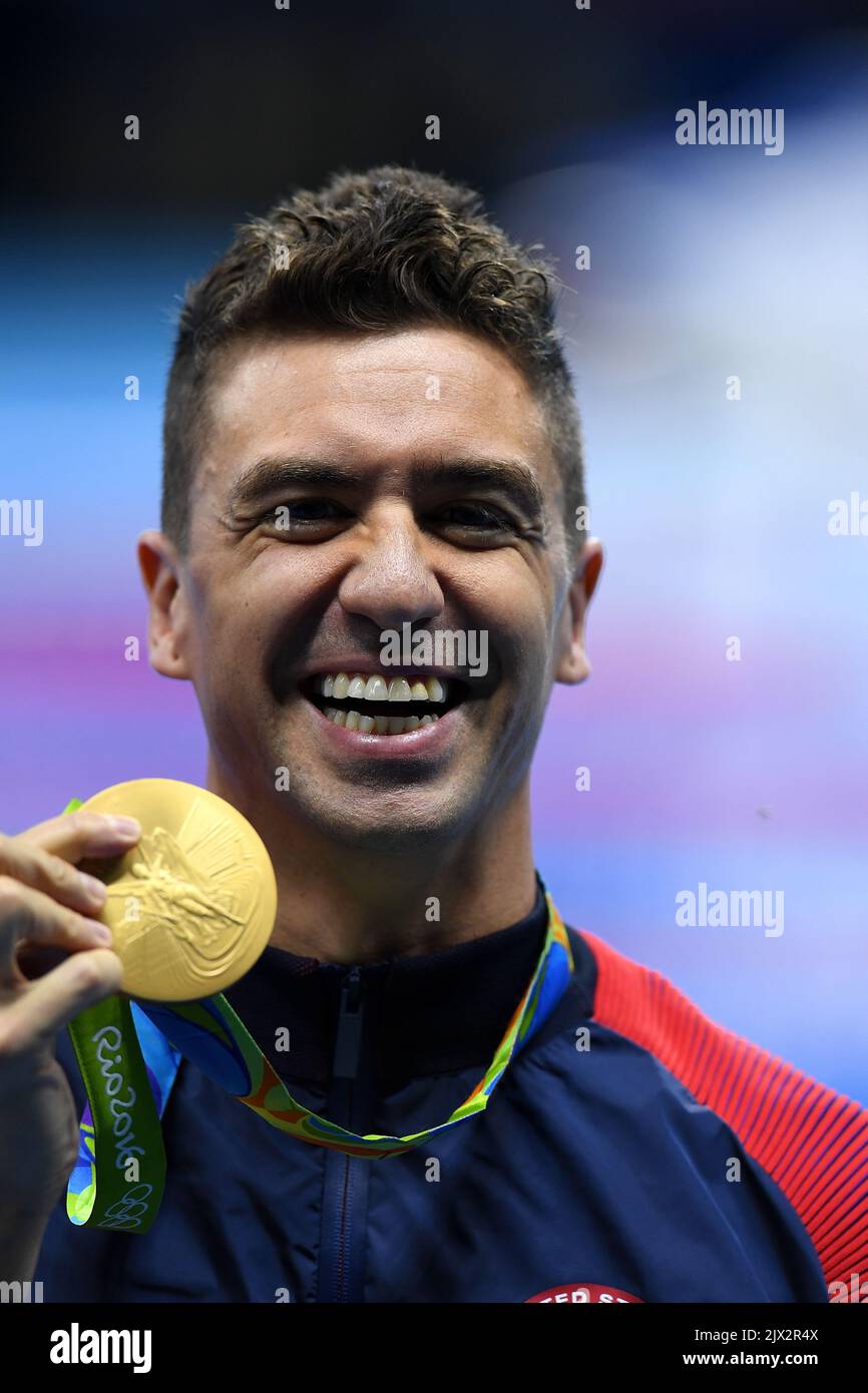 Anthony Ervin Of The United States Poses For Photographs After A Gold Placing In The Mens 50m 