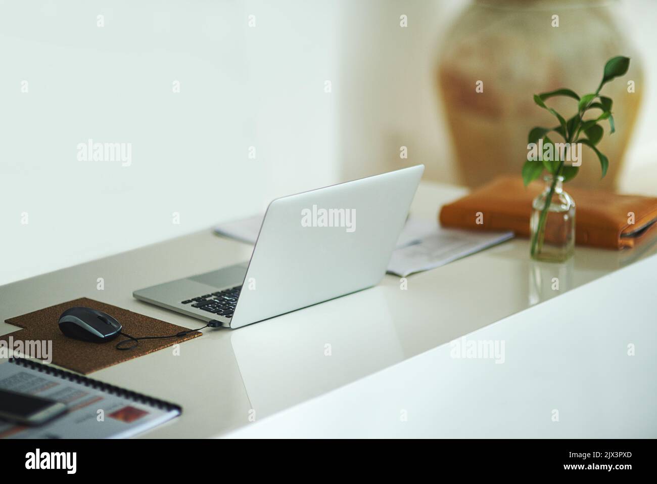 Everything you need to start a blog. a laptop on a desk in a creative